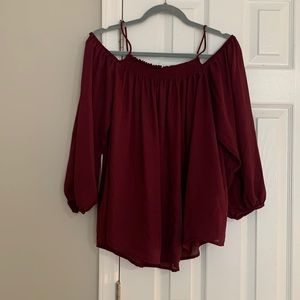 Plum, open shoulder blouse.